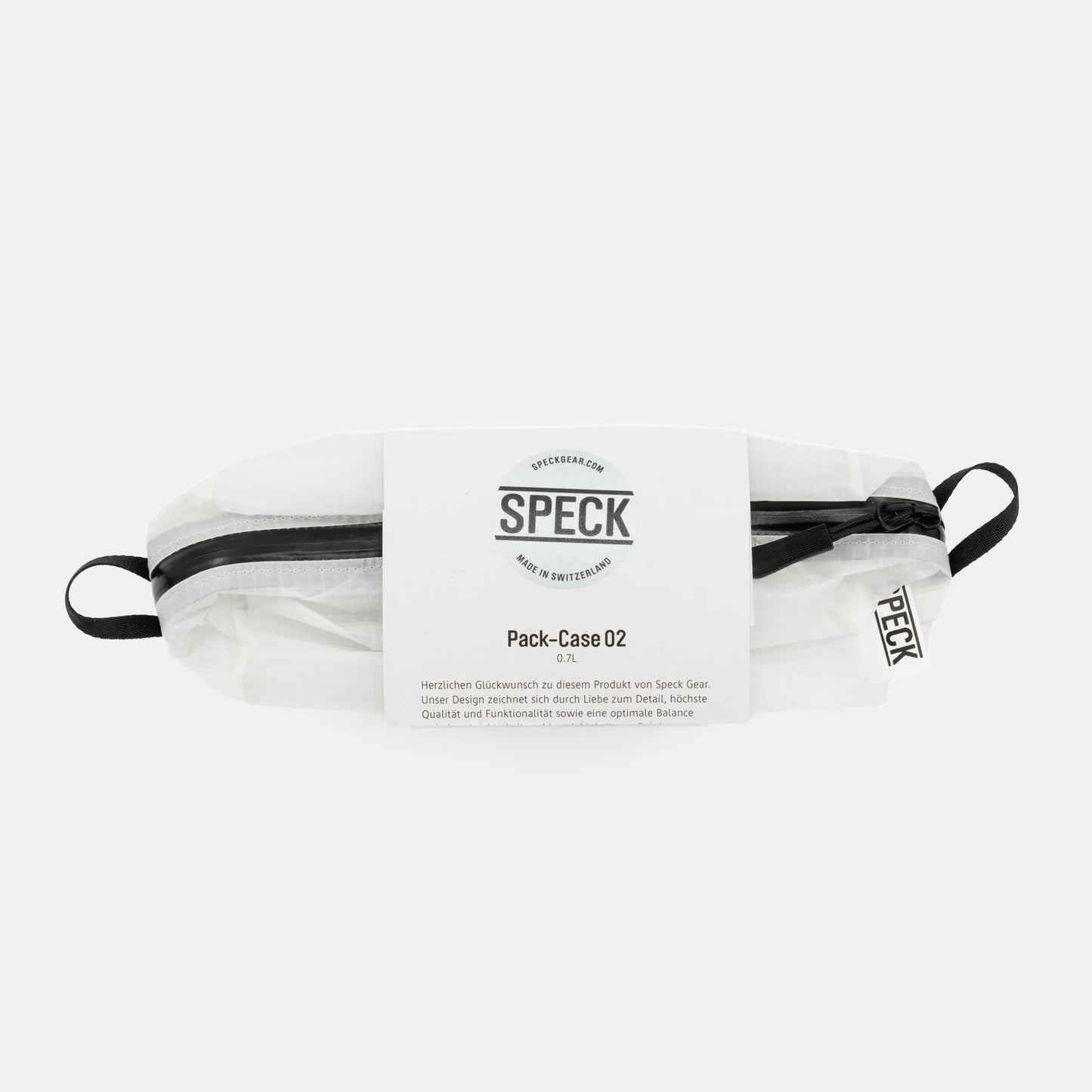 Speck Gear Kulturbeutel in Weiss – Bikepacking Pack Cases von oben mit Banderole verpackt