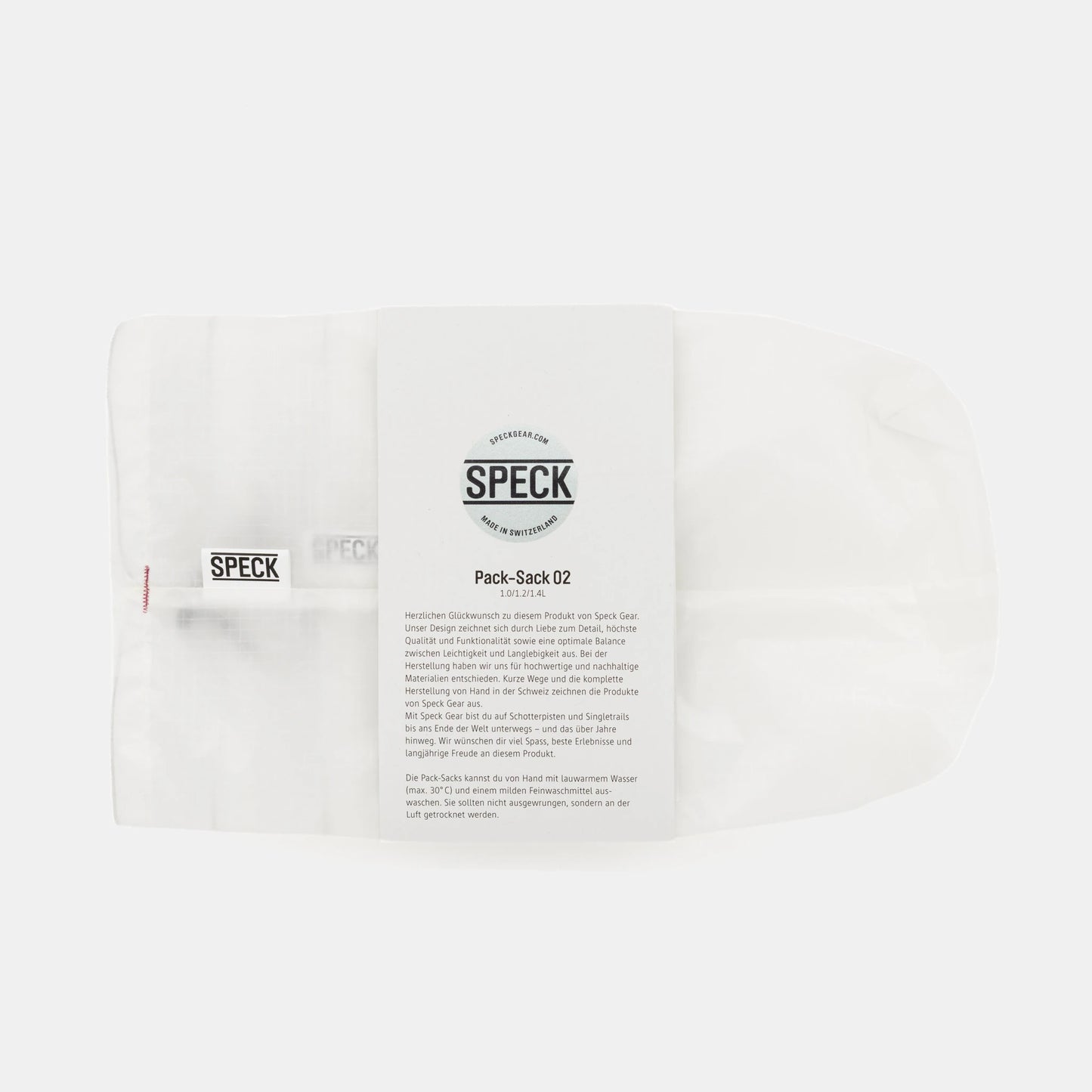 Speck Gear Pack Säcke in Weiss – 3 Bikepacking Pack Sacks von oben mit Banderole verpackt