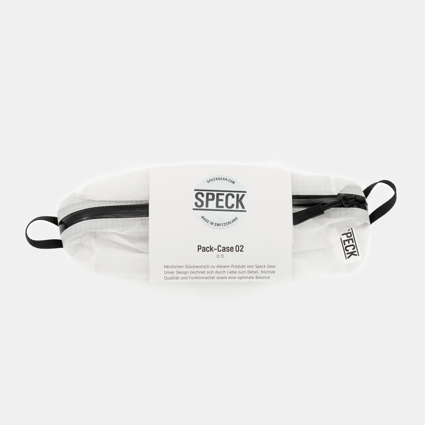 Speck Gear Kulturbeutel in Weiss – Bikepacking Pack Cases von oben mit Banderole verpackt